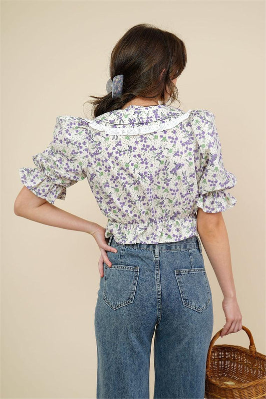 Blusa con cuello de muñeca y mangas abullonadas con estampado floral