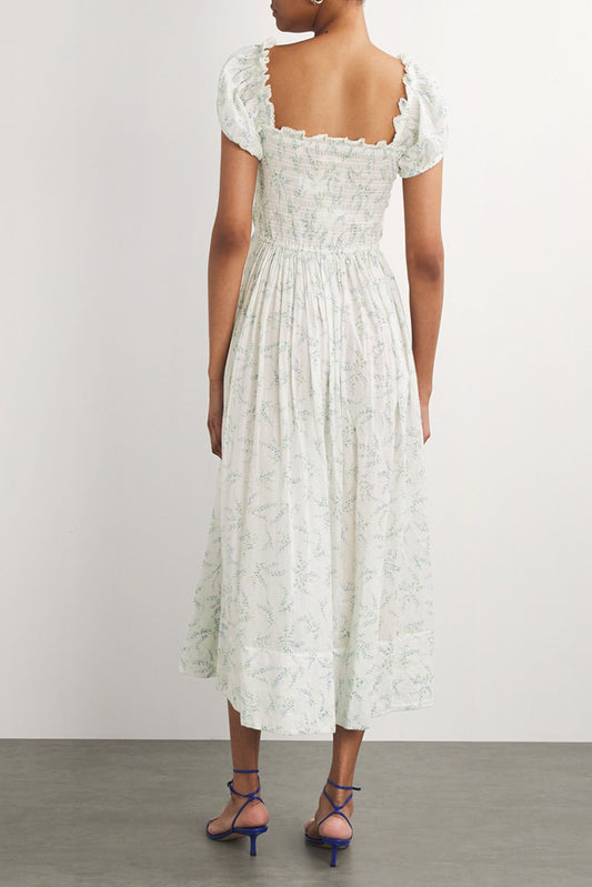 Vestido midi con mangas abullonadas y fruncido floral