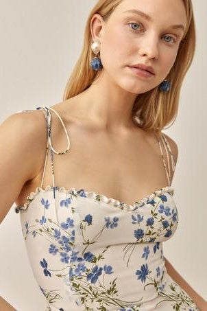 Vestido midi sin mangas con encaje floral