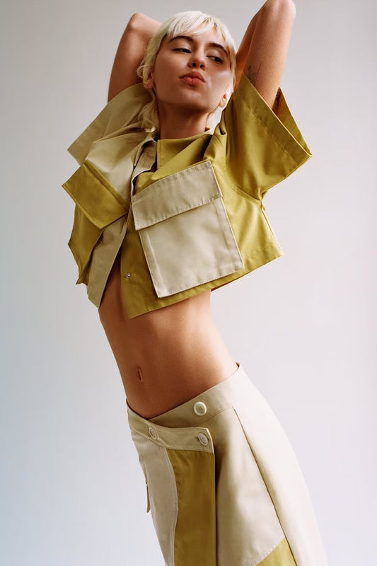 Gabardina de retazos de tela, camisa corta, falda de retazos, decoración de bolsillo, pantalón ajustado, traje para mujer