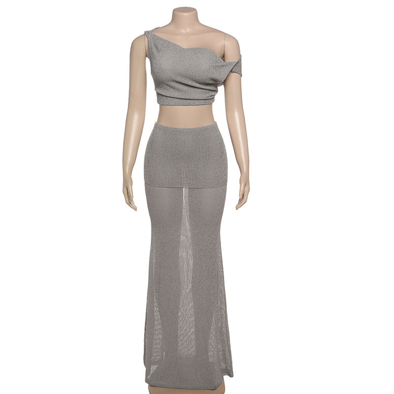 Conjunto de ropa de primavera para mujer, top sexy con hombros oblicuos y espalda descubierta, falda ajustada de color liso.