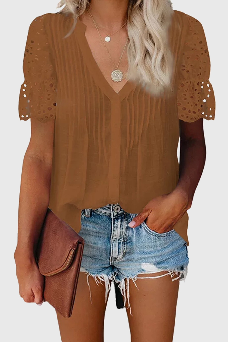Elegante blusa de cuello en V con patchwork ahuecado y liso