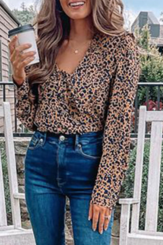 Tops elegantes de moda con cuello en V y abertura en la articulación