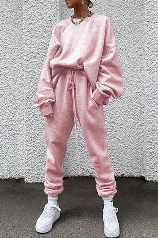 Conjunto informal de dos piezas con cuello redondo, manga larga y bolsillos sólidos