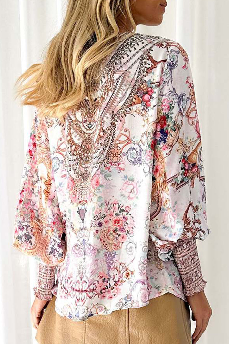 Blusas elegantes con cuello en V y estampados