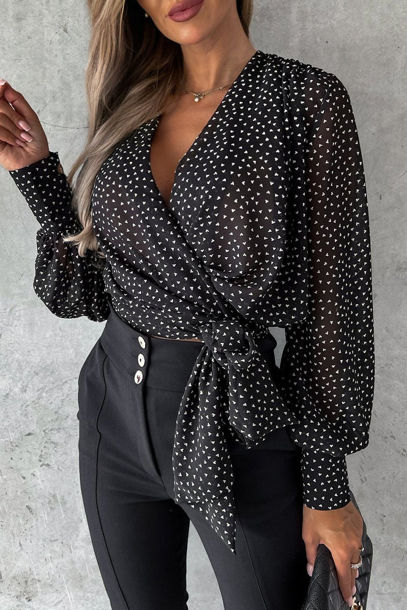 Tops sexis elegantes con escote en V y estampado floral