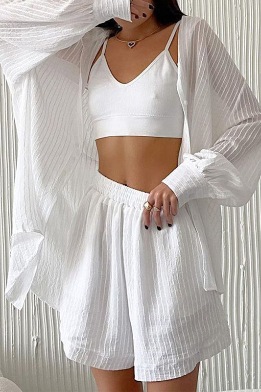 Conjunto de dos piezas informal, sencillo, con botones lisos, cuello vuelto y manga larga