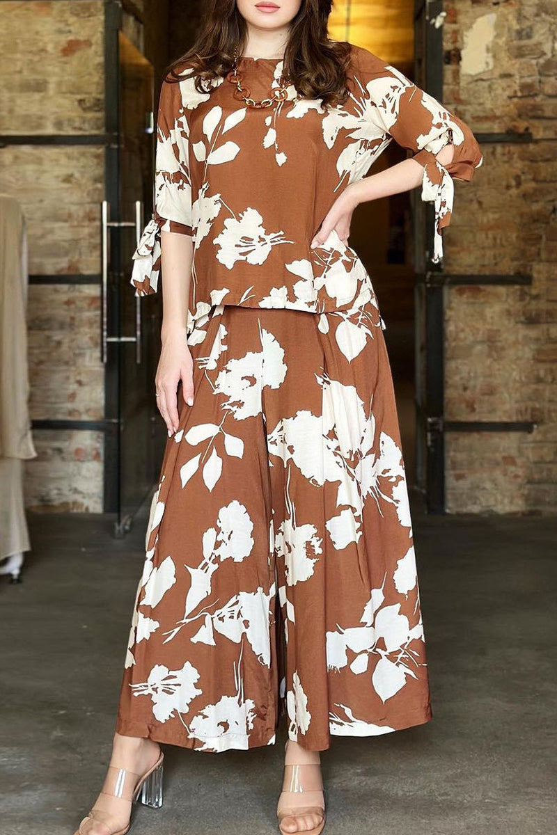 Conjunto de dos piezas vintage elegante con frenillo floral, cuello redondo y media manga
