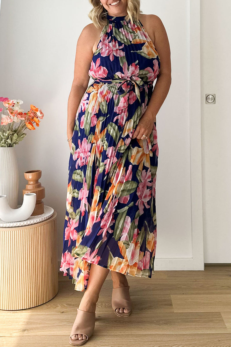 Vestido vintage elegante con estampado floral y cuello halter