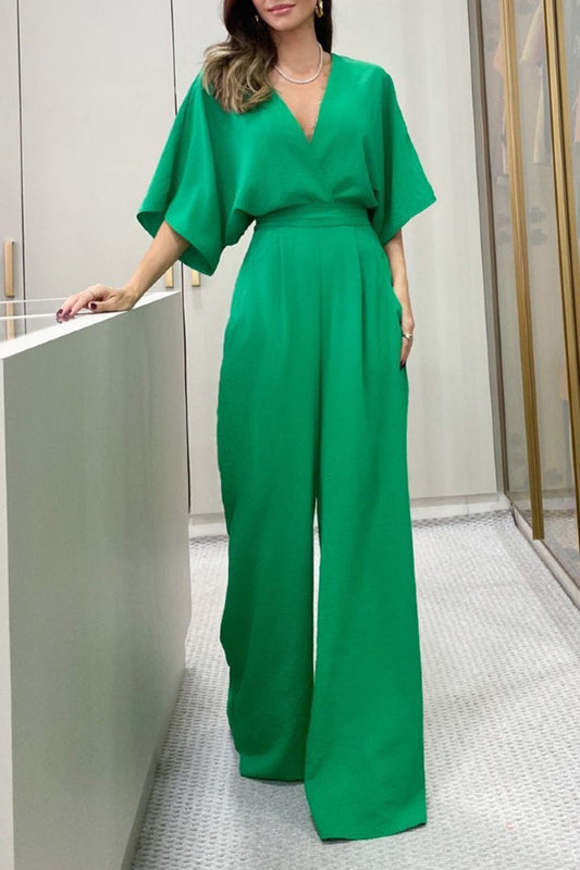 Mono elegante, holgado, liso, con frenillo, espalda descubierta y escote en V