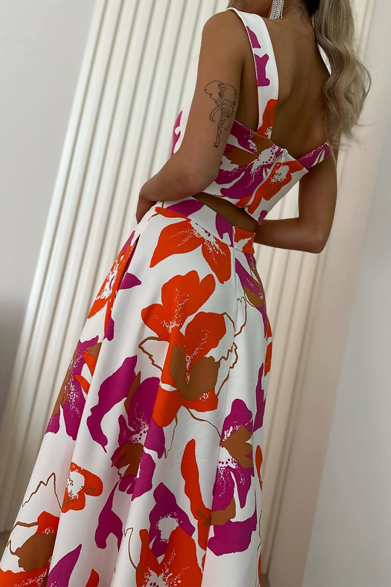 Elegante conjunto de dos piezas sin mangas con cuello cuadrado y bolsillo con estampado floral