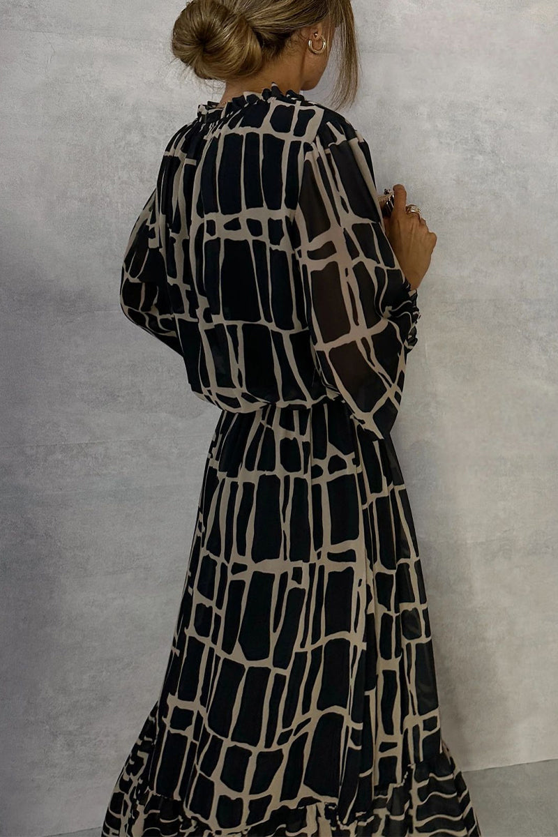 Elegante vestido de corte A con cuello redondo, encaje y estampado geométrico