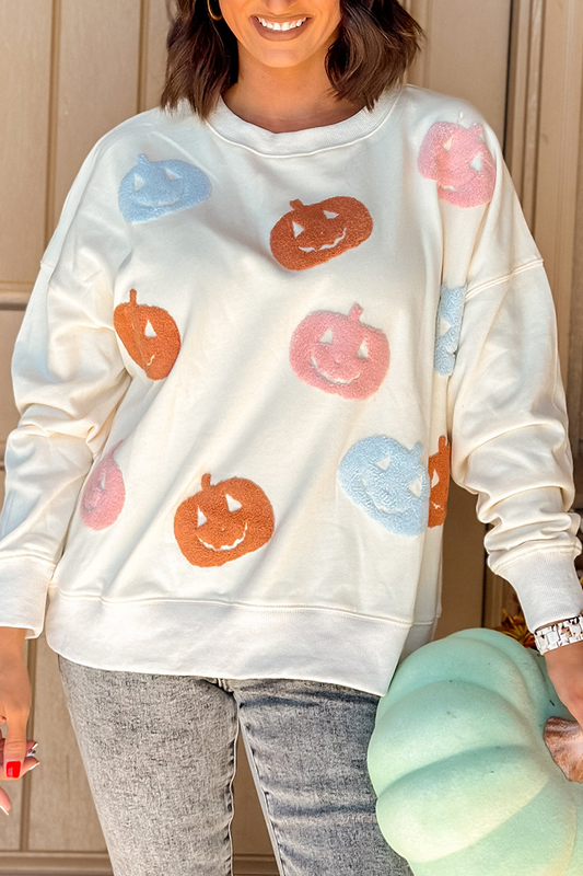 Sudadera informal con cuello redondo y parche de calabaza