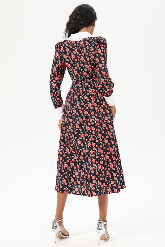 Vestido midi negro con botones y cuello de muñeca y mangas largas con estampado floral