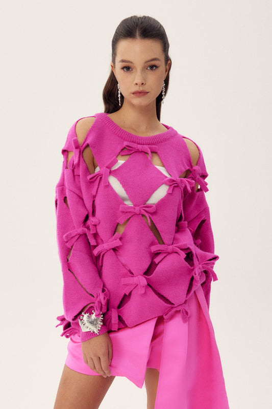 Suéter oversize con lazo recortado Sielia