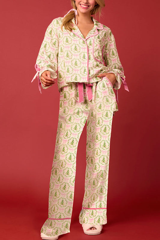 Conjunto de top de terciopelo con estampado navideño, manga larga, bolsillos y pantalones anchos con cintura elástica.