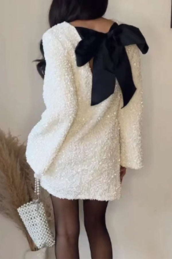 Vestido de fiesta de lentejuelas con lazo en la espalda y mangas largas