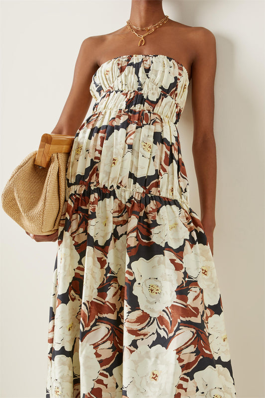 Vestido midi sin mangas con volantes florales