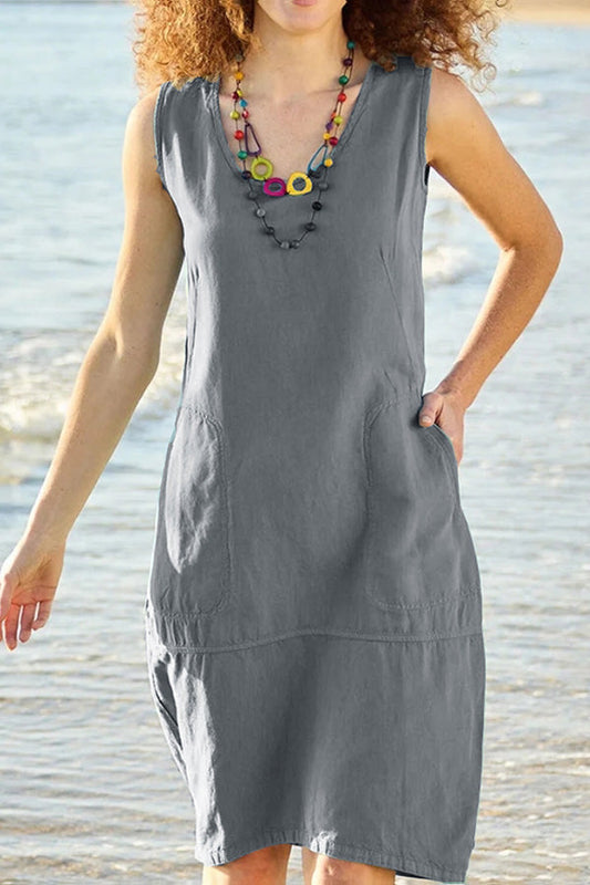 Vestido midi de algodón y lino en color Chun con escote en U, sin mangas y con bolsillos