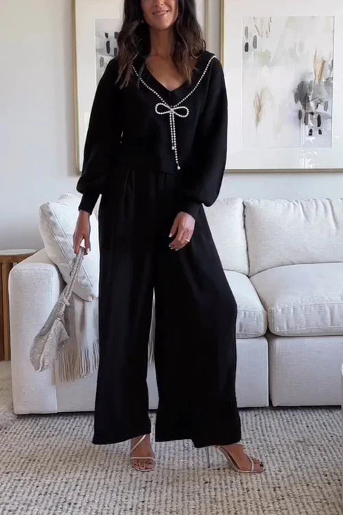 Suéter con lazo elegante