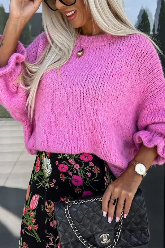 Suéter de punto de manga larga con volantes y cuello redondo de color liso