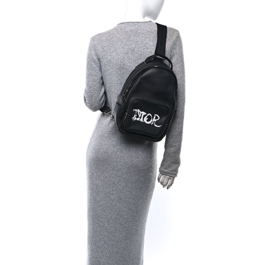 X PETER DOIG Grained Calfskin Slingbag Backpack Black