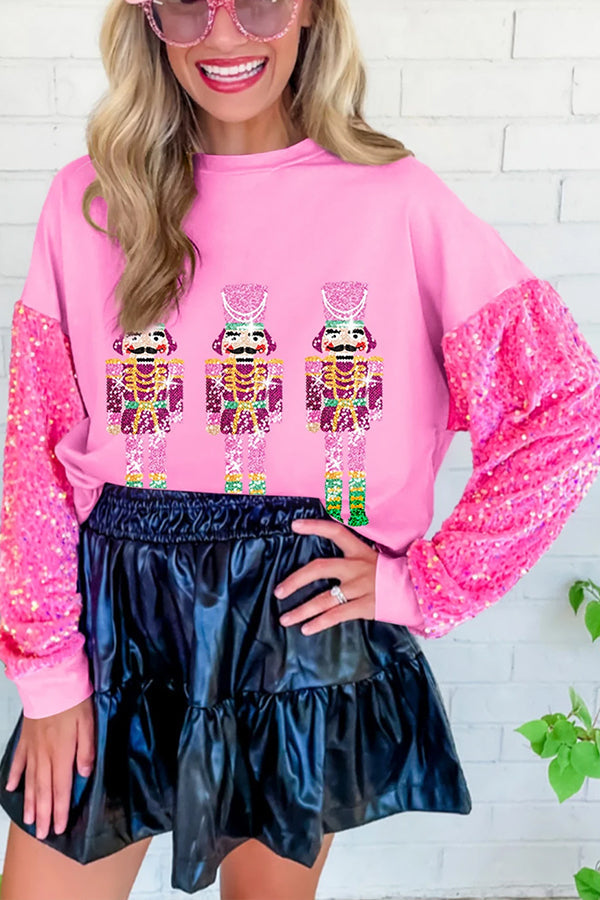 Sudadera con estampado de patchwork y mangas de lentejuelas de Cascanueces en color rosa