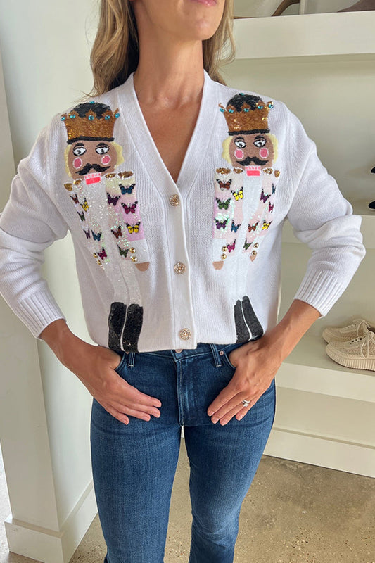 CÁRDIGAN DE CASCANUECES CON MARIPOSAS BLANCAS
