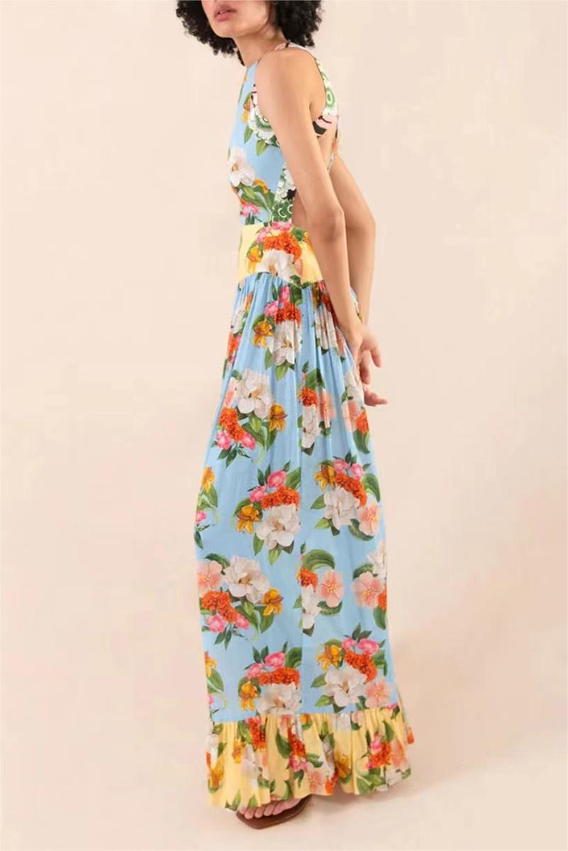 Vestido largo con volantes y encaje floral