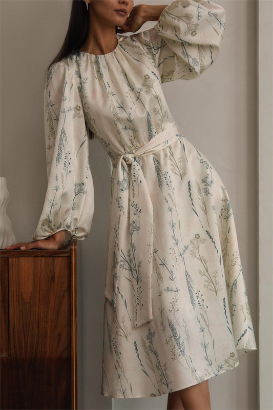 Vestido midi con cuello redondo, mangas farol y encaje floral