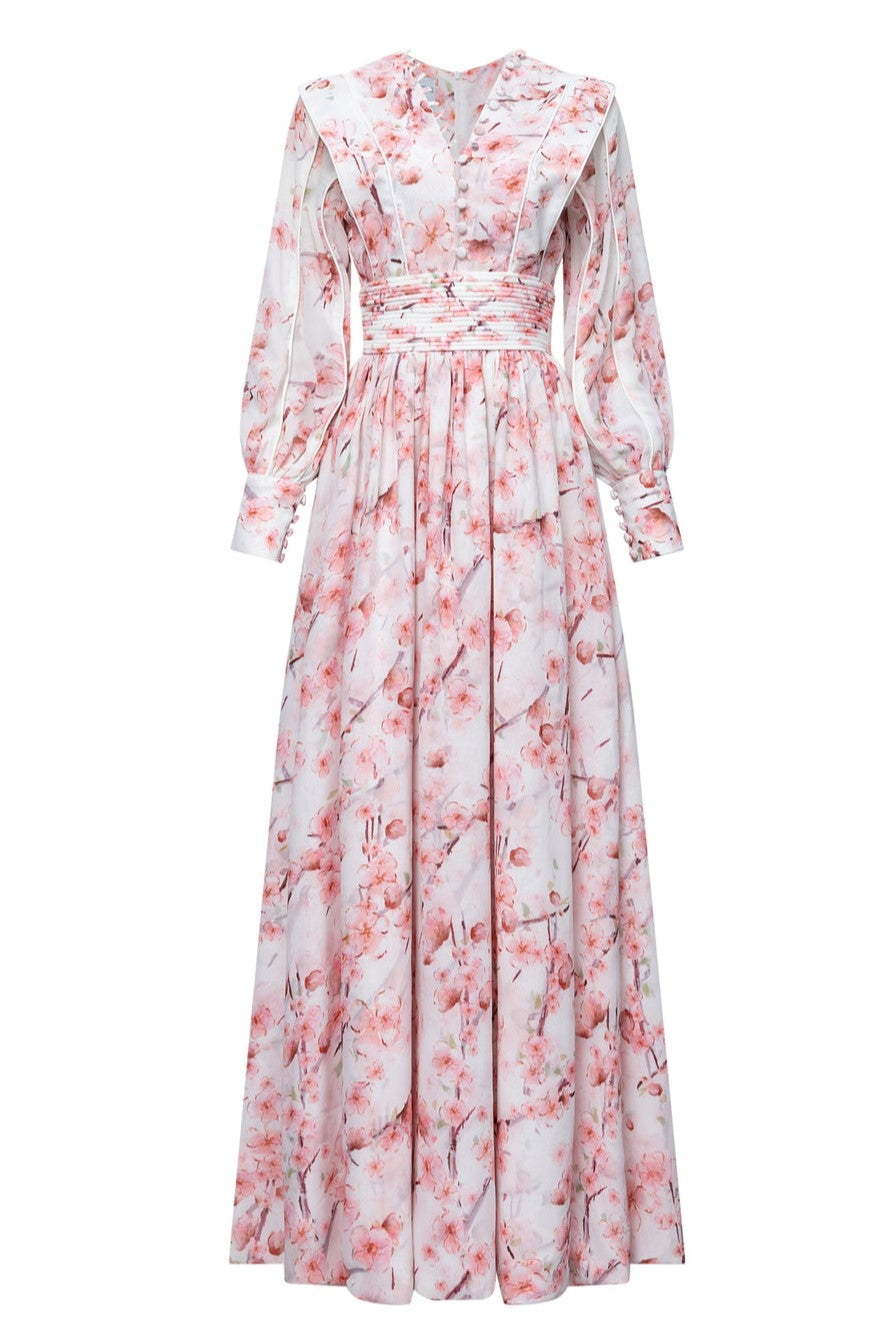 Vestido midi de manga larga con estampado floral y botonadura sencilla