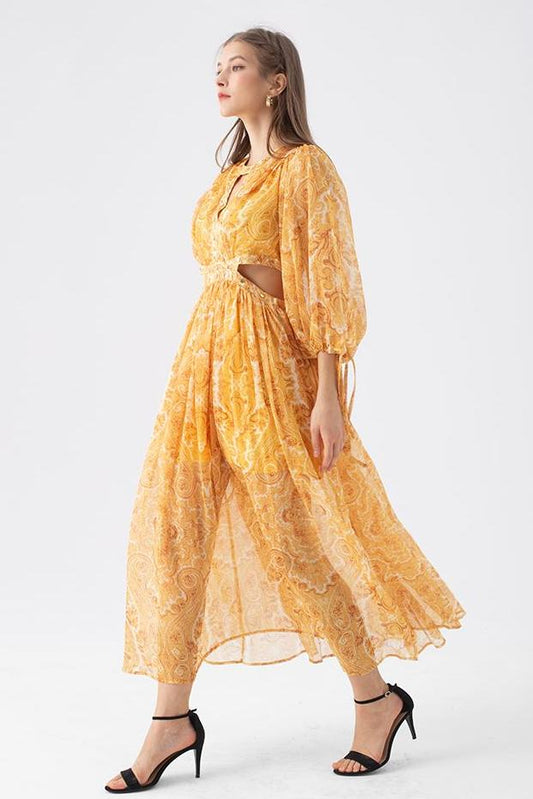 Vestido midi de manga larga con aberturas y estampado abstracto