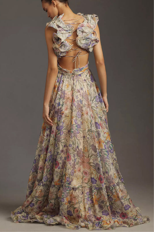 Vestido largo floral plisado con espalda descubierta y cordones