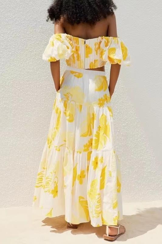 Conjunto de top bordado con hombros descubiertos y vestido midi de cintura alta