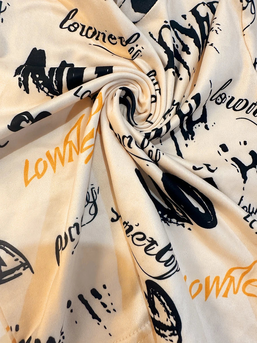 Conjunto de dos piezas de pantalón ajustado con estampado de letras y top corto para mujer, cuello redondo de alta elasticidad, otoño e invierno, 2025
