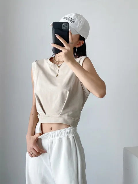 Nueva llegada primavera verano color sólido casual suelto corto cuello redondo camisetas sin mangas chaleco deportivo top plegable