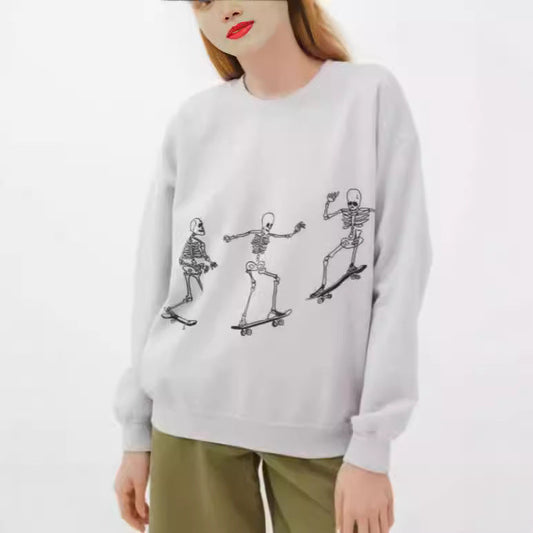 Otoño Invierno mujeres usan manga larga color sólido calavera patineta impresión suelta casual mangas largas