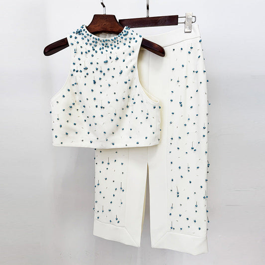 Conjunto de dos piezas con chaleco y falda dividida y cuentas de Heavy Industry