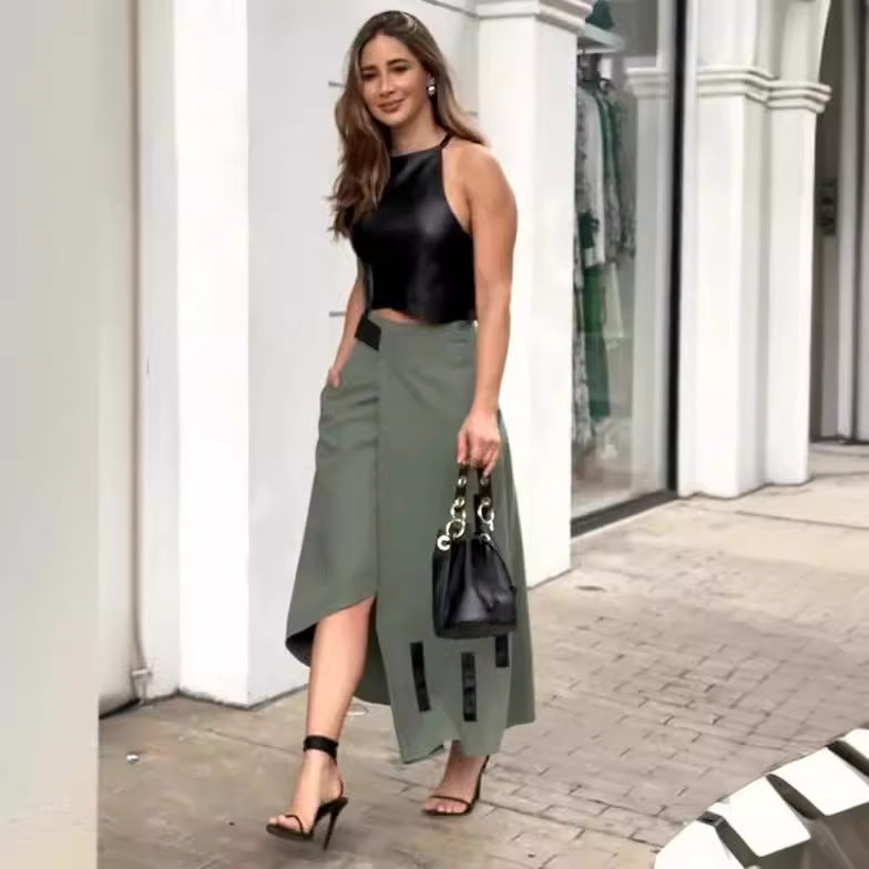 Traje de mujer sin mangas con cuello halter y top corto con falda asimétrica irregular de dos piezas