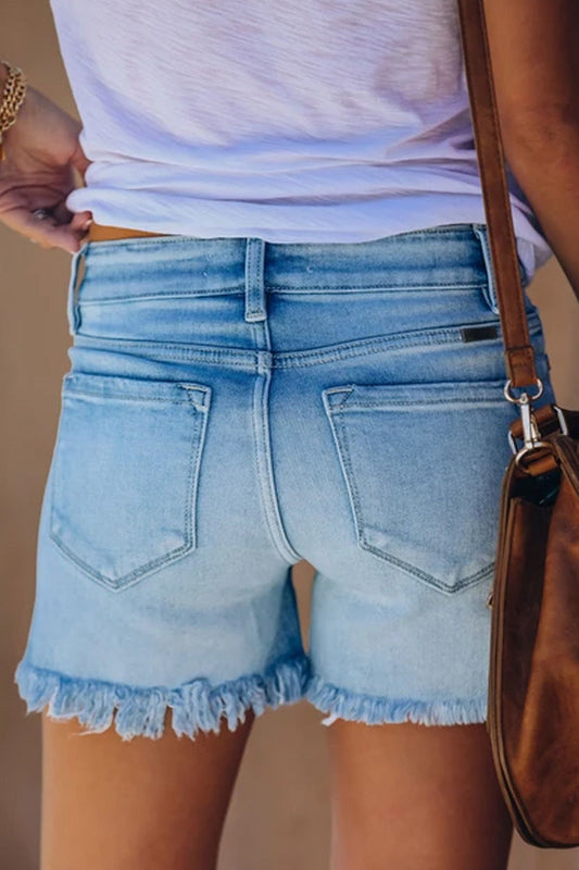 Shorts vaqueros lisos con flecos rotos
