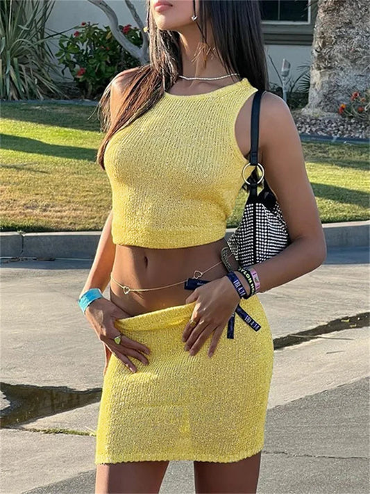 Conjunto de 2 piezas de suéter de punto y minifalda para mujer, jersey sin mangas, conjuntos de top y falda sexys de moda, prendas de punto lisas.