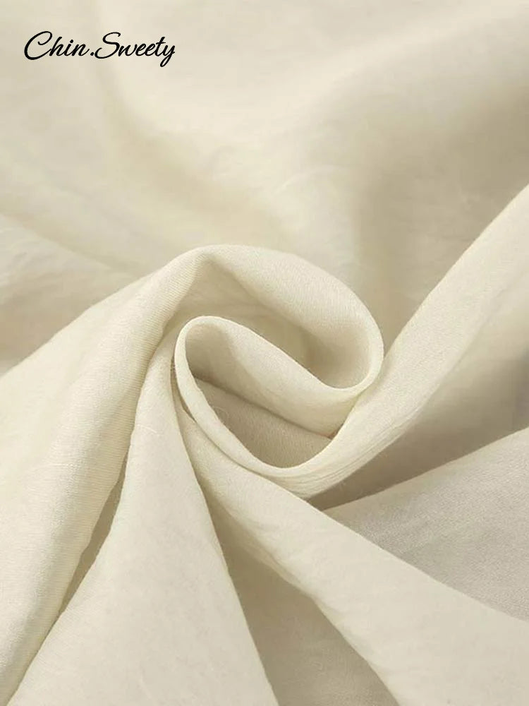 Conjunto de 2 piezas de pantalones cortos holgados con volantes para mujer, cuello en V, camisas caladas, pantalones cortos de pierna ancha, traje blanco para primavera y verano 2025.