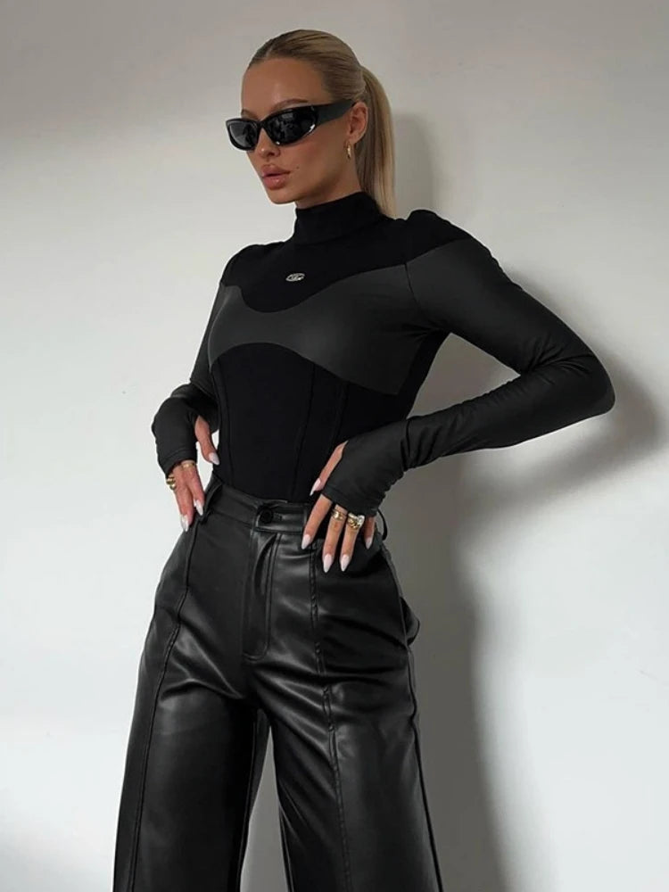 Body de manga larga con cuello alto para mujer, lencería sexy, top negro, mono de una pieza de PU con retazos