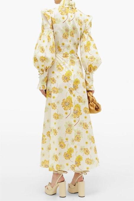Vestido largo con cuello alto y mangas farol con estampado floral