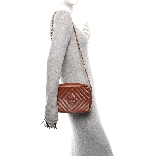 Caviar Chevron Quilted Tassel Camera Case Brown