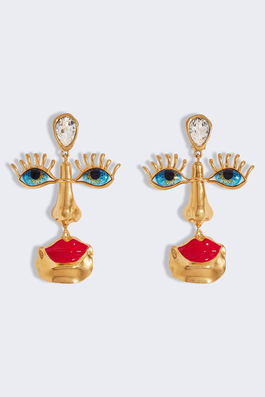 Pendientes retro con cara de mal de ojo