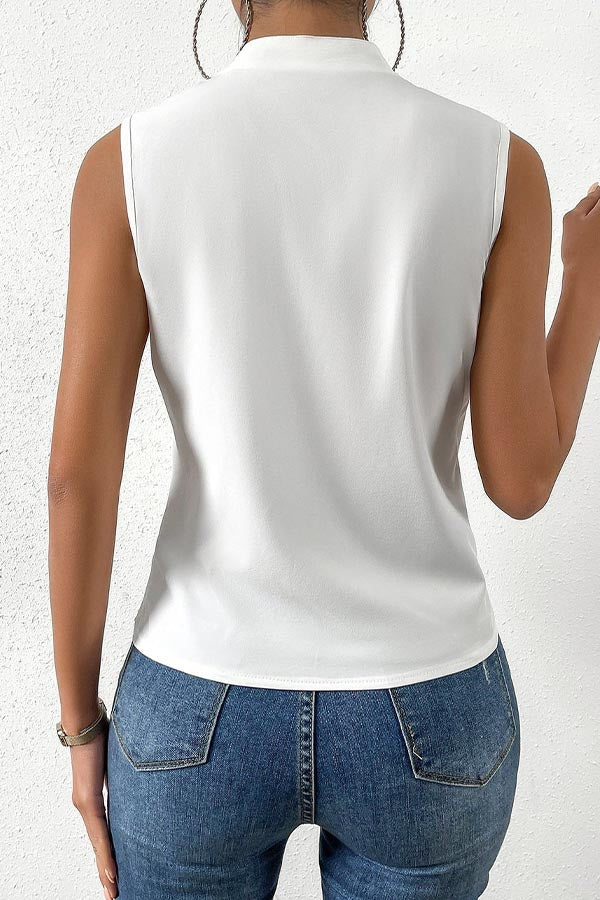 Blusa lisa sin mangas con clase