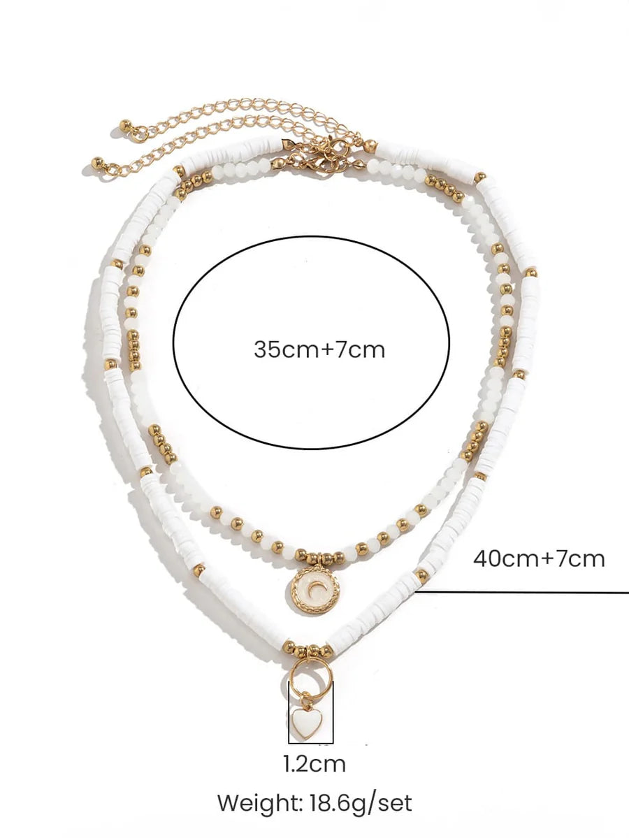 Collar de cristal con forma de corazón bohemio