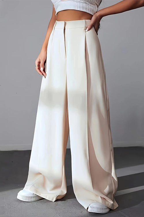 Pantalones anchos de tiro alto con bolsillos