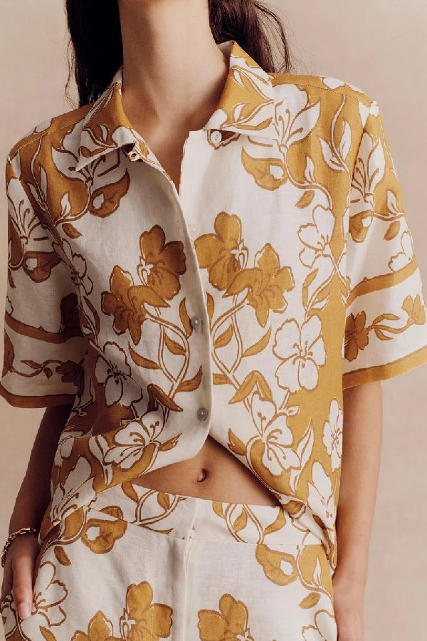 Conjunto de camisa informal de manga corta con estampado floral y pantalón holgado con cintura elástica y bolsillos